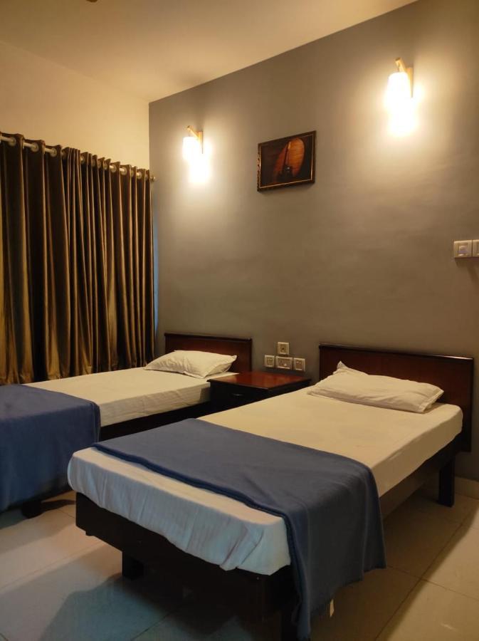 Appartement Orkuz Residency à Kochi Extérieur photo