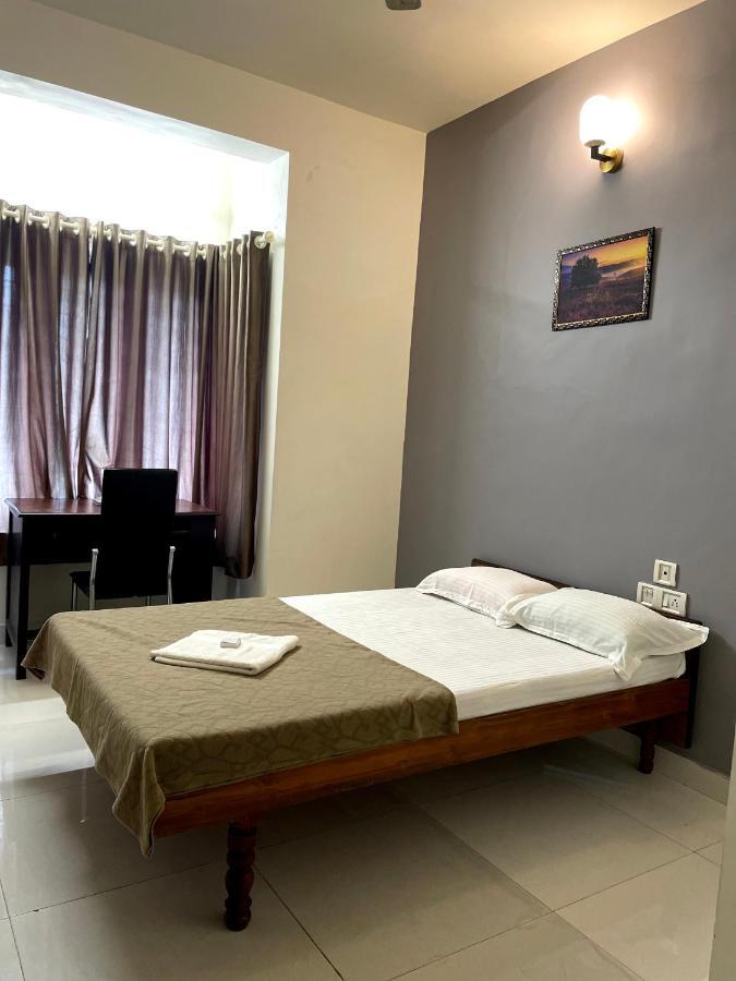 Appartement Orkuz Residency à Kochi Extérieur photo