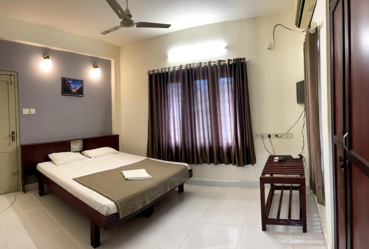 Appartement Orkuz Residency à Kochi Extérieur photo