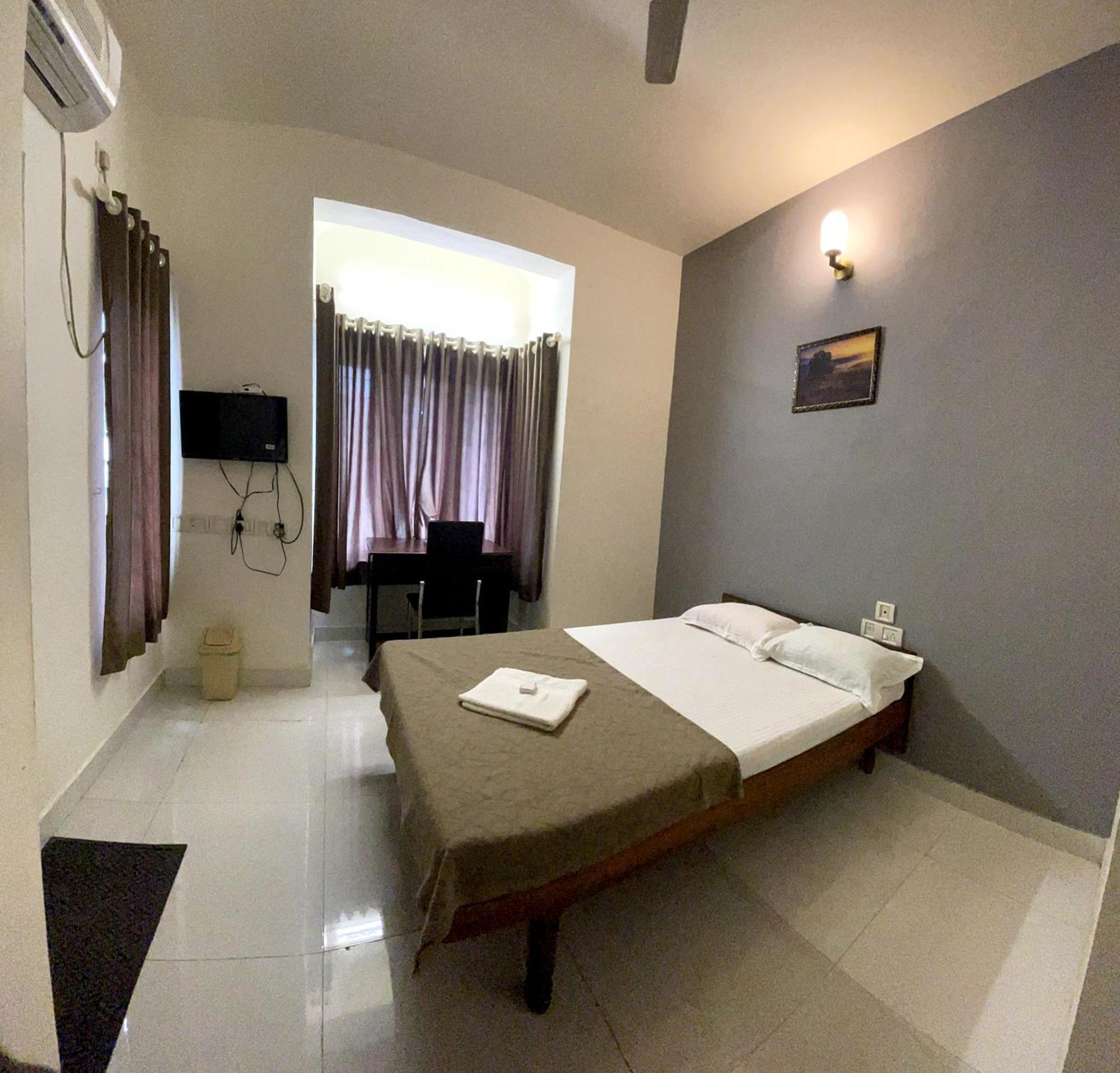 Appartement Orkuz Residency à Kochi Chambre photo