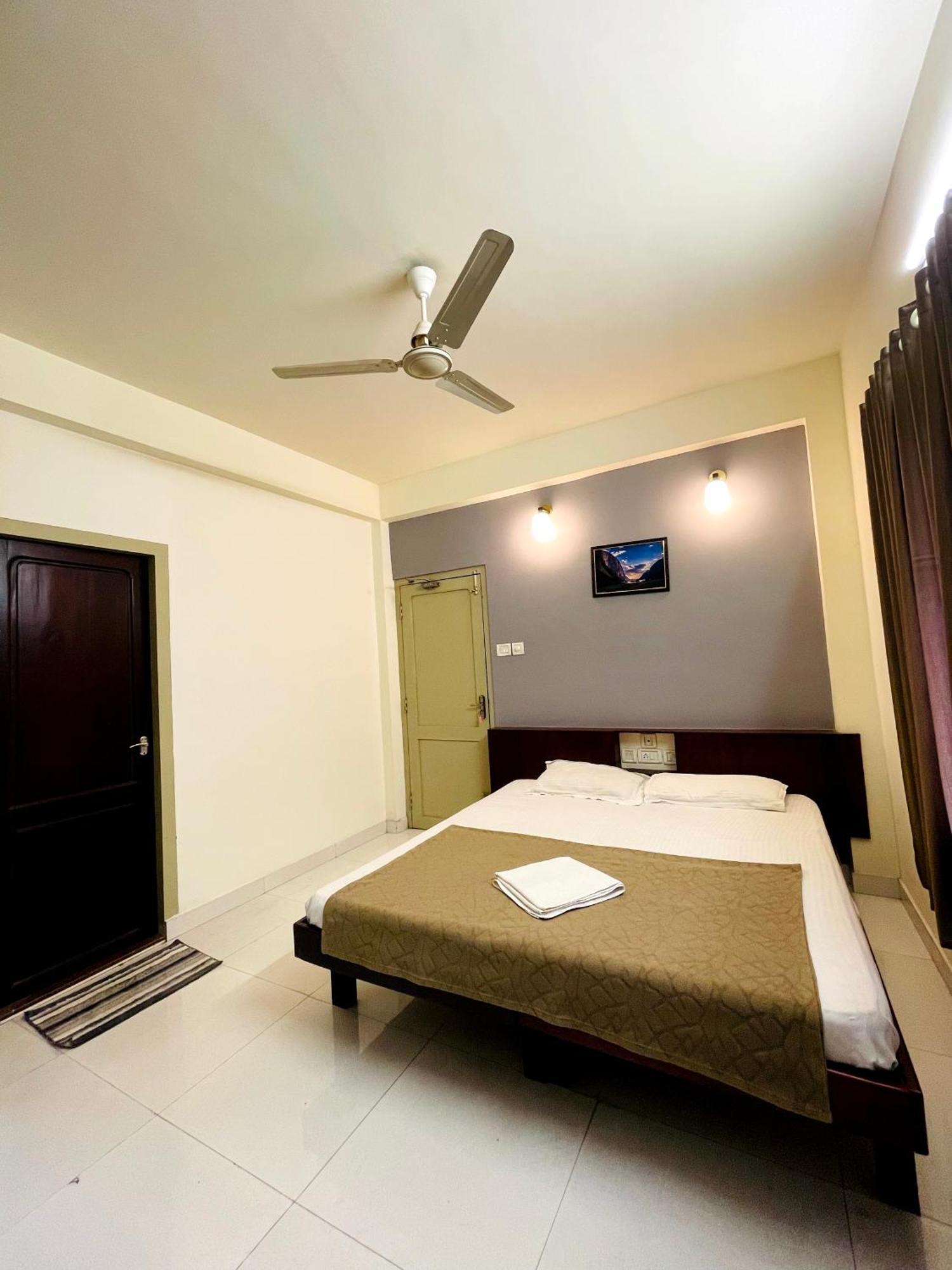 Appartement Orkuz Residency à Kochi Extérieur photo