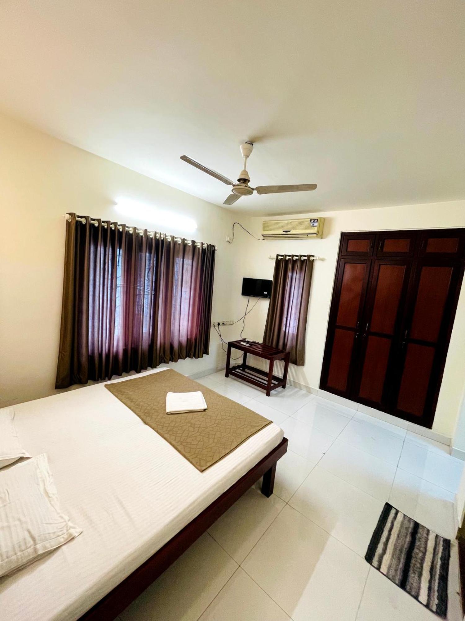 Appartement Orkuz Residency à Kochi Extérieur photo