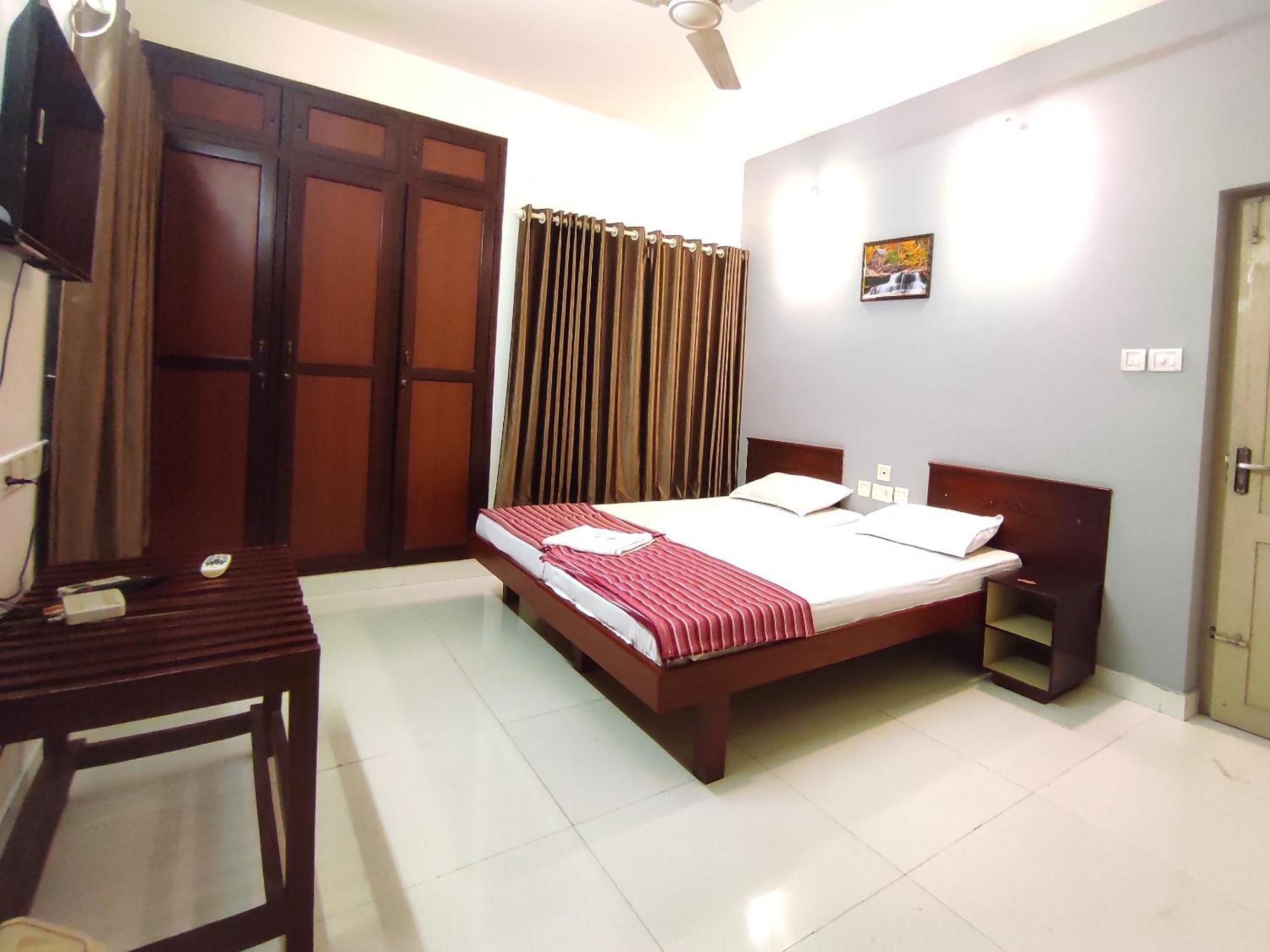 Appartement Orkuz Residency à Kochi Chambre photo